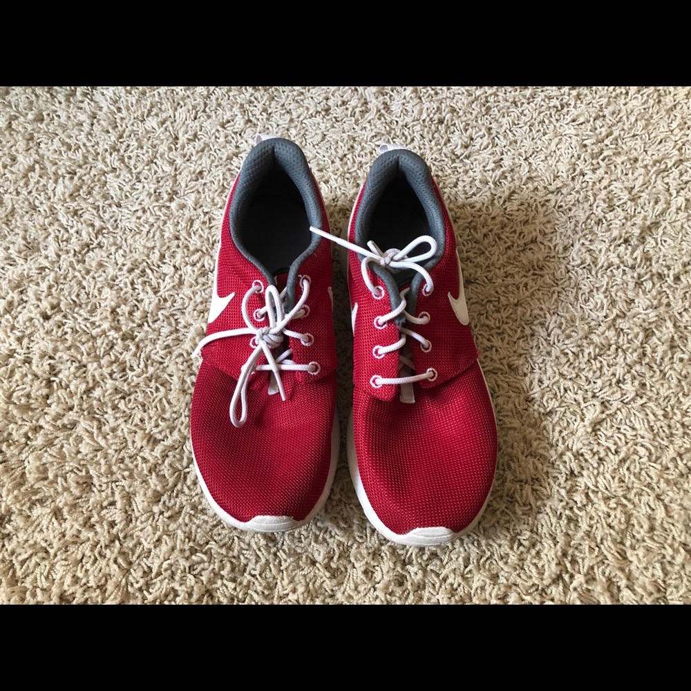 Red Nike tennis shoes